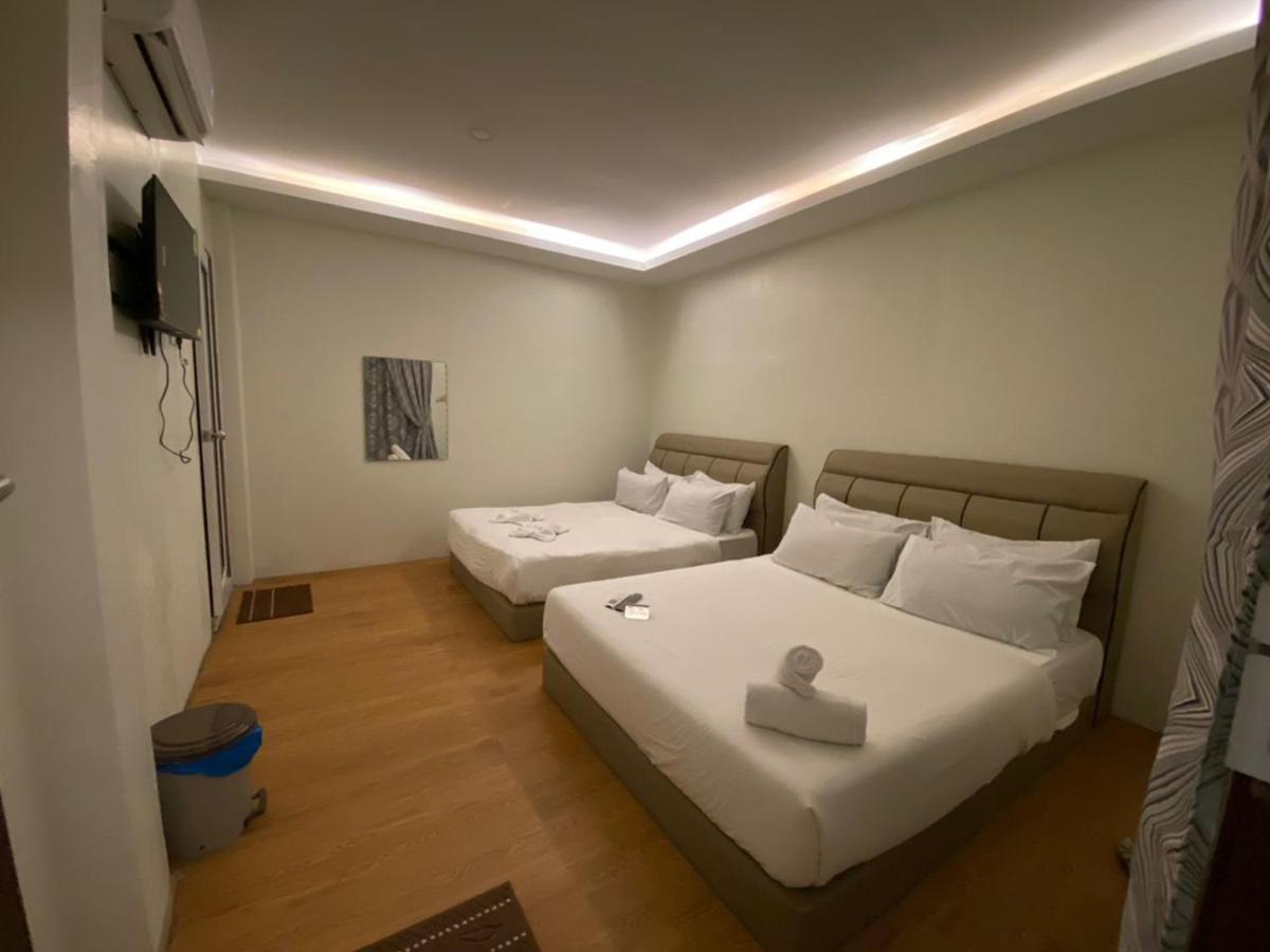 Pine Hotel Batu Gajah Bagian luar foto